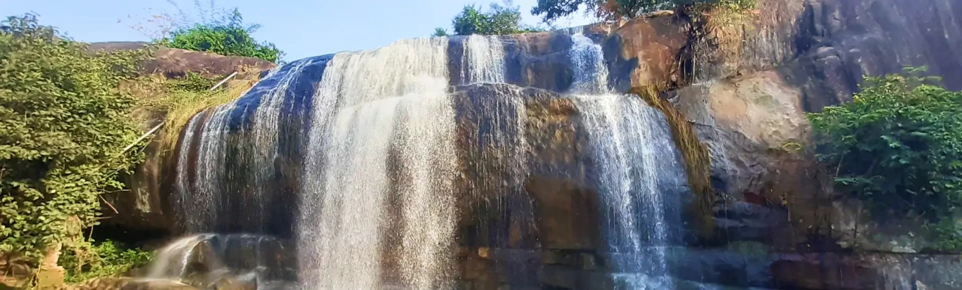 Gandahati Waterfall cascading over rock ledges in Gajapati