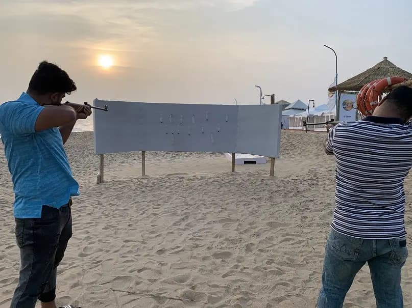 Guests taking part in archery at Eco Retreat Konark