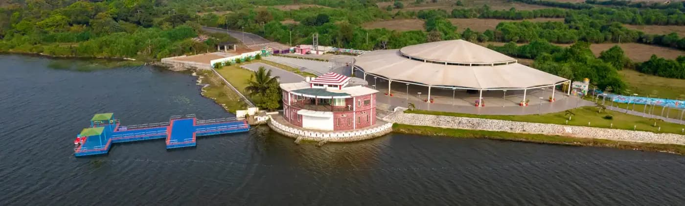 Tampara freshwater lake aerial with floating jetty and waterside visitor pavilion